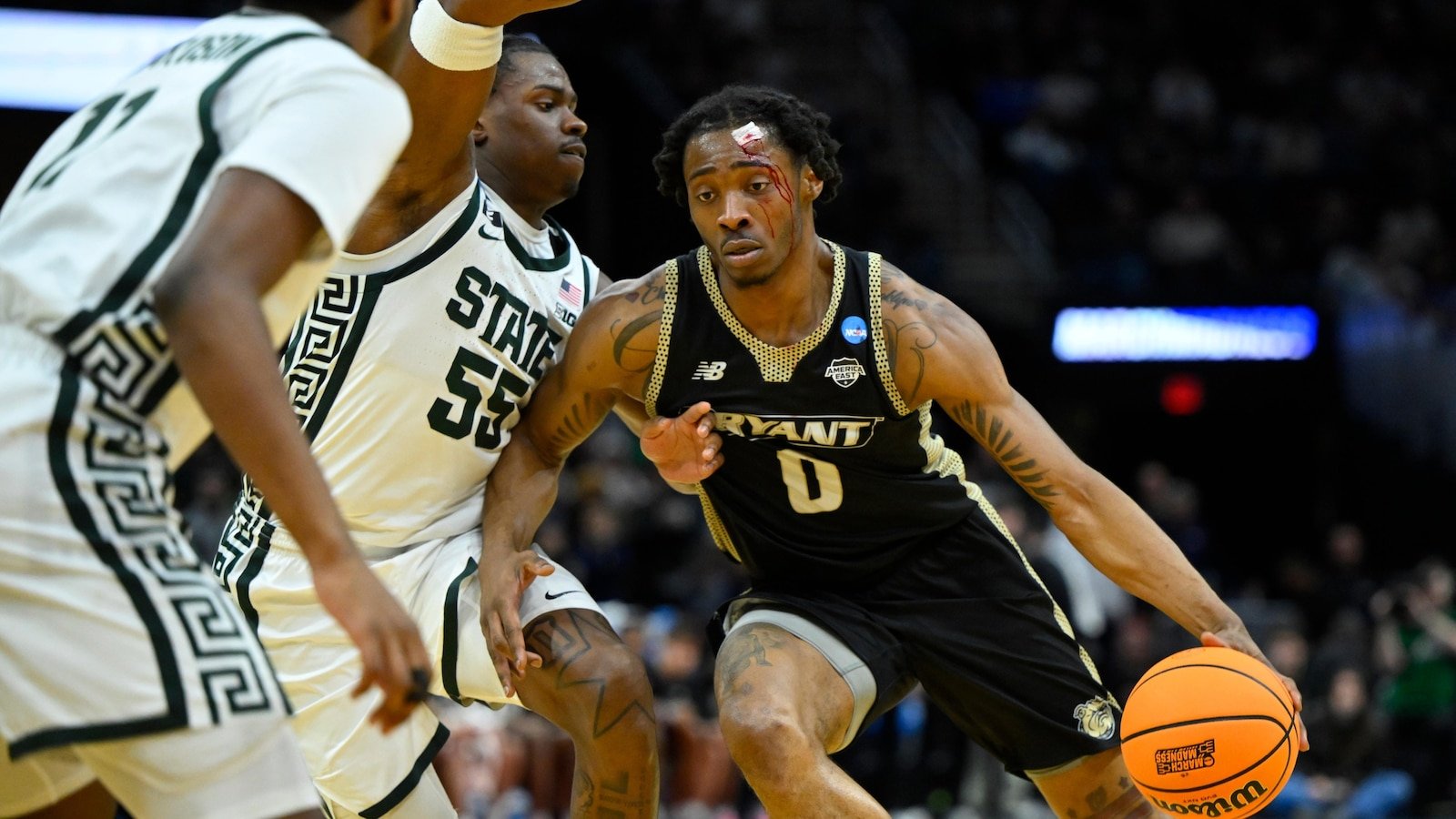 Bryant's guard, Earl Timberlake, gives the Bulldogs his only bloody moment in March Madness