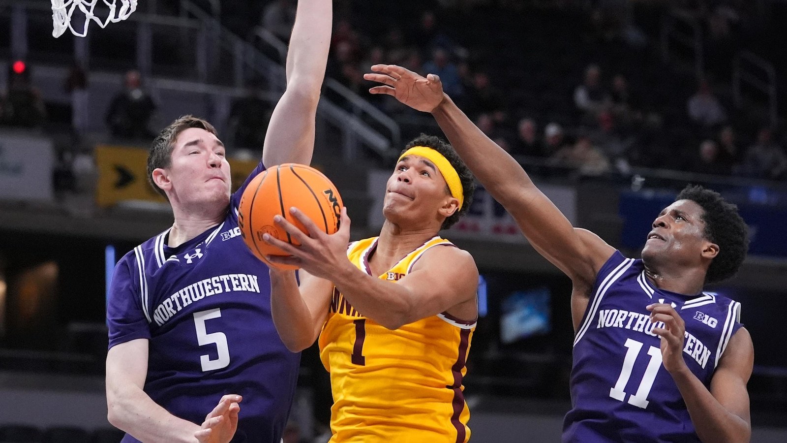 Martinelli scores 28 and Northwestern expires to Minnesota 72-64 to start the Big Ten tournament