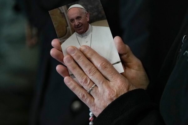 Pope has a 'peaceful night' after his forecast improves and gets up