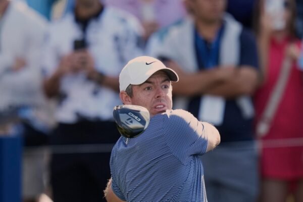 Rory Mcilroy Mama in a video of him taking phone from the player of the University of Texas who is marking it