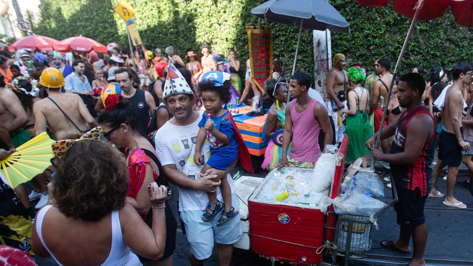 Street vendors dispens the fuel for the river carnival party, but the reference face