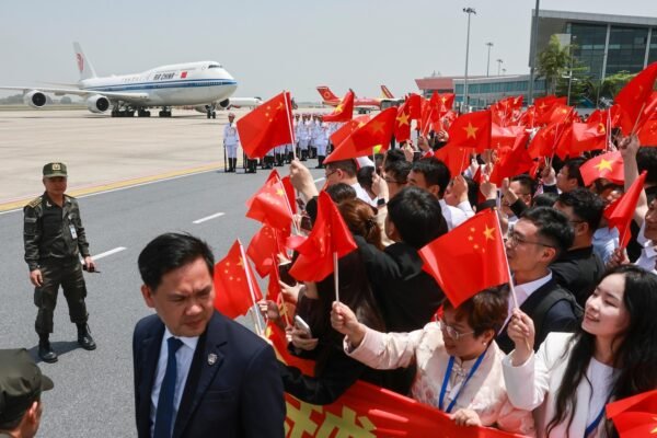 China's XI says there are no winners in a tariff war while visiting Southeast Asia