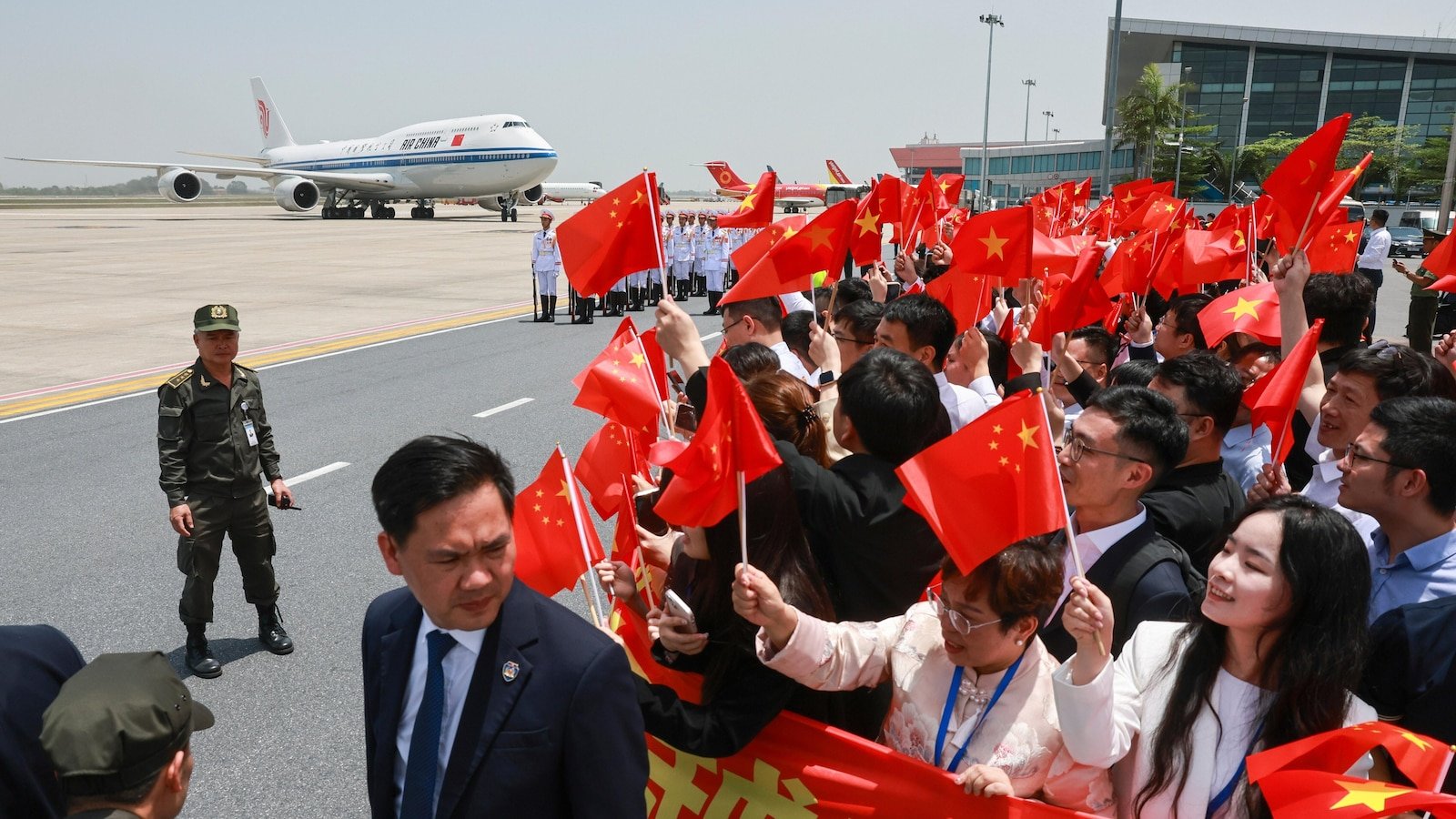 China's XI says there are no winners in a tariff war while visiting Southeast Asia