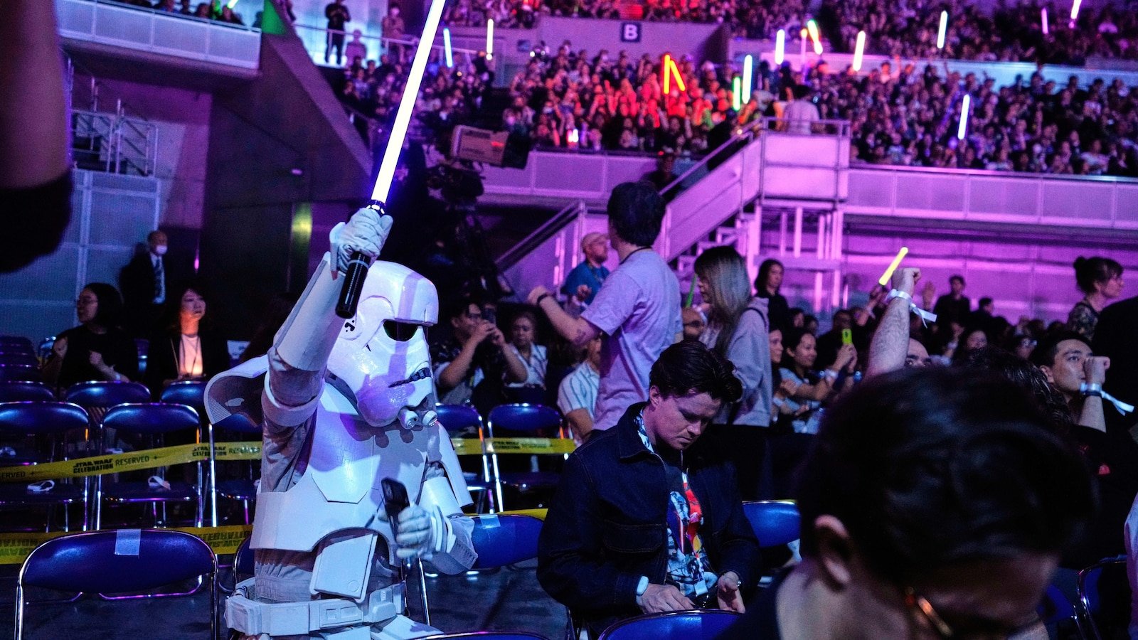 The 'Star Wars' fans wave the lightsaber as an upcoming film is announced in Japan