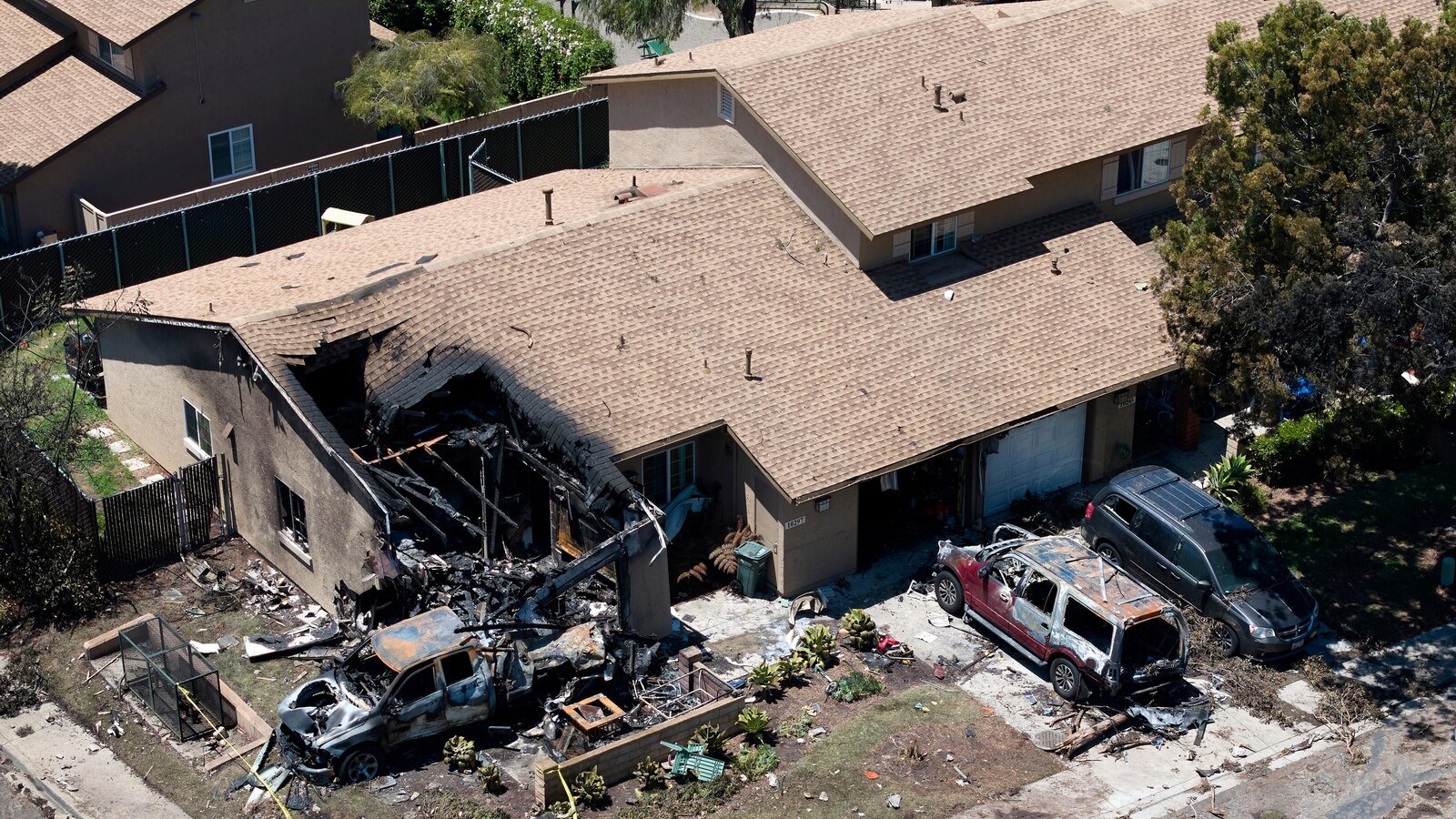 A musical talent agency says that 3 employees died on an plane that crashed into a San Diego neighborhood