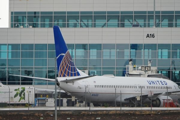 Air traffic controllers at Denver Scrable to use backup copies after losing communications on Monday