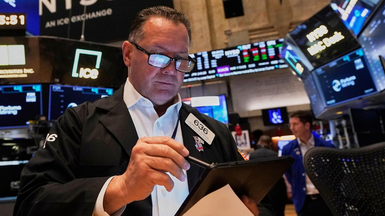 Asian actions work higher after Wall Street rises moderately, since the Fed has stable rates