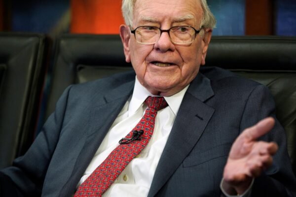 Buffett plans to attend, but not ask questions, at the Berkshire shareholders meeting next year