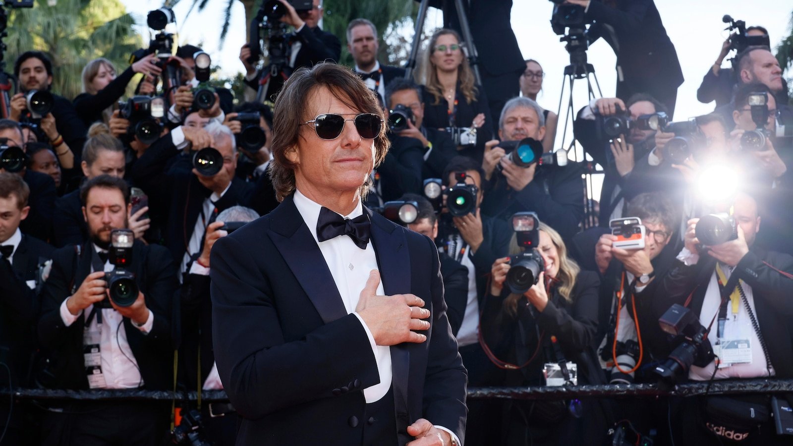 Cannes prepares to grant the palme d'Or, with a neon positioned to add to an unprecedented streak