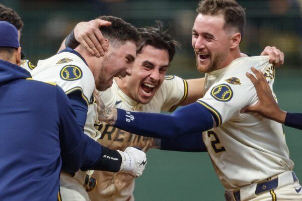 Durbin's sacrifice fly gives the brewers a 6-5 victory over the red socks