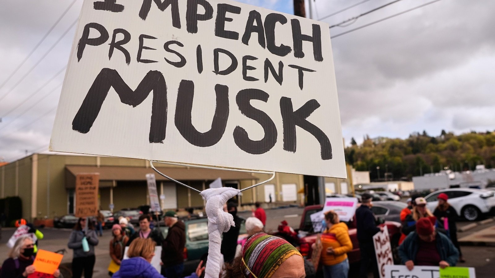 Elon Musk says he will reduce political spending after he strongly support Trump in 2024