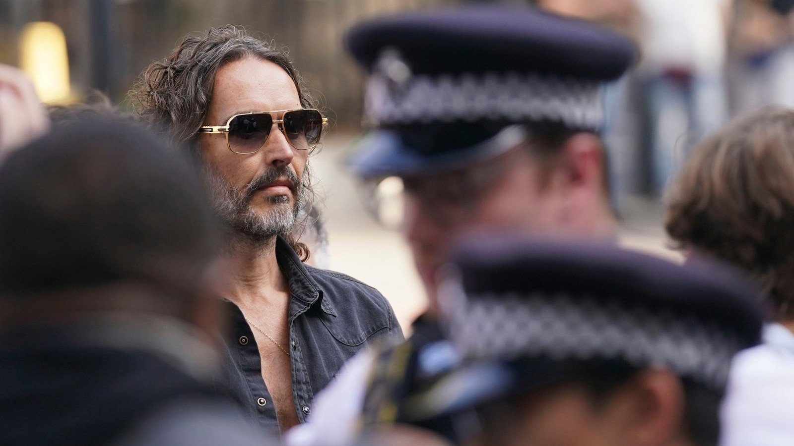 Russell Brand granted a conditional bond after appearing in the Court of London for charges of rape and assault