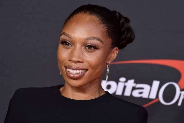 Serena, Allyson Felix, coach K between the class of the US Olympic Paralympic