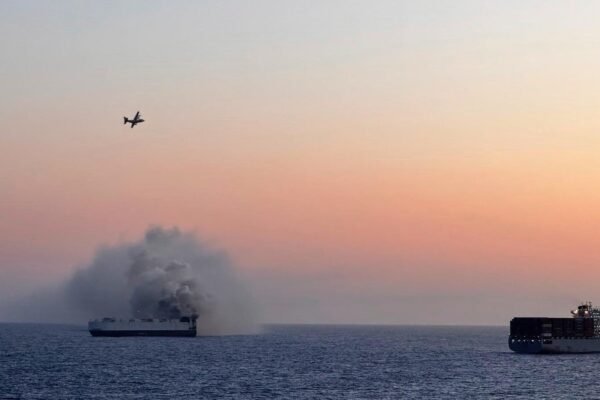 22 members of the safe crew after the fire aboard the cargo ship that transports vehicles outside Alaska